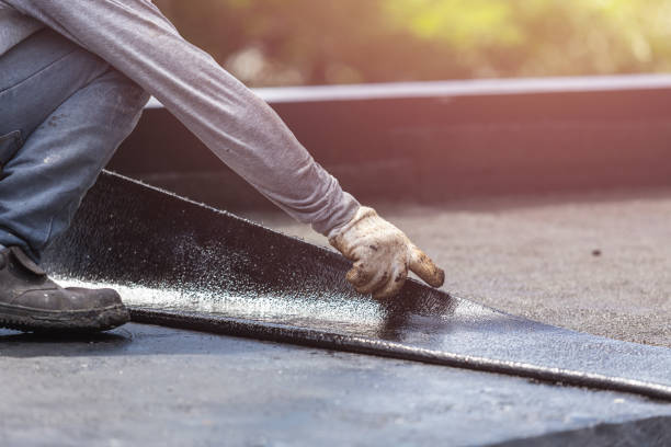 Professional Waterproofing technician working in Laura, OH